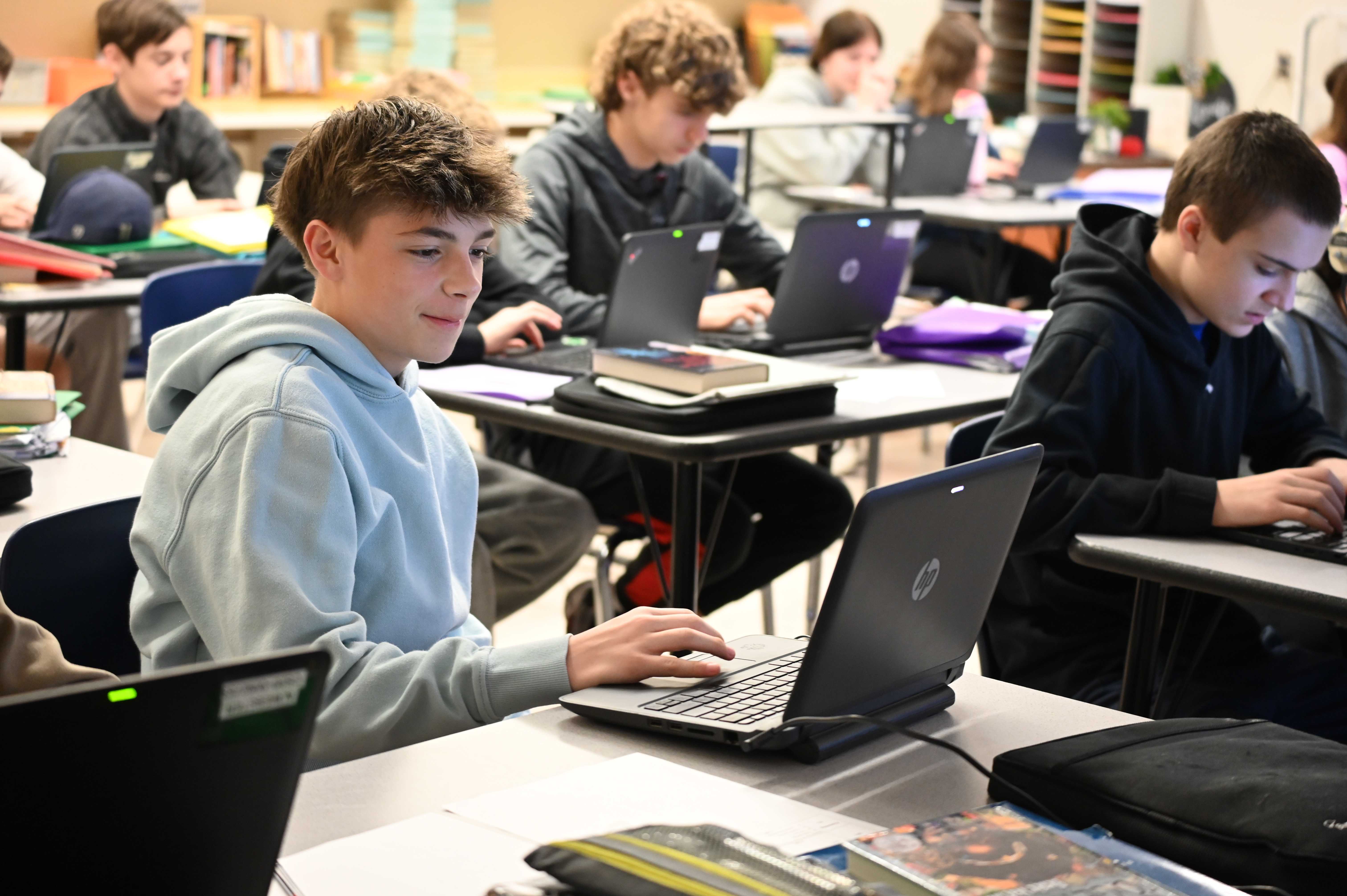 Cosgrove student working on laptop